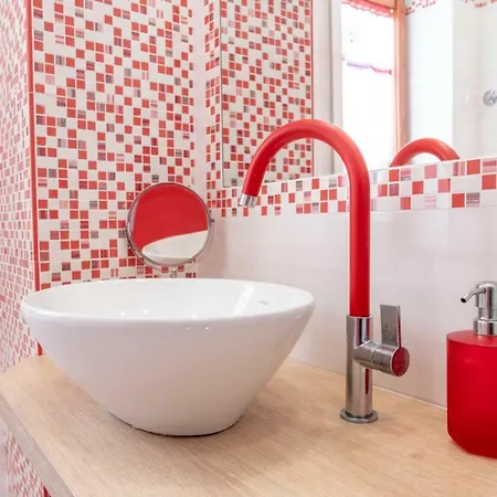 Casa Lolla, A Red Rose In